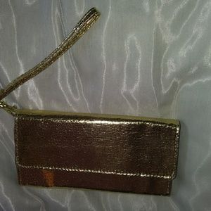 Brand new wristlet with a cellphone holder.